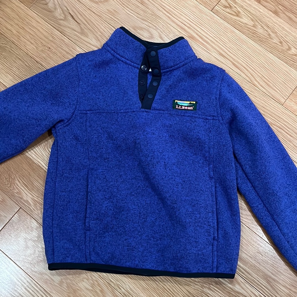 Purple never worn fleece lined LL Bean sweater. No tags but never worn.